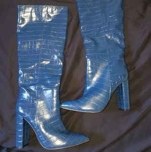 Knee high boots. Only used once.